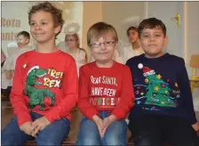  ?? In the Christmas spirit: pupils at from Moyderwell sit on stage ahead of their Christmas concert on Thursday. ??