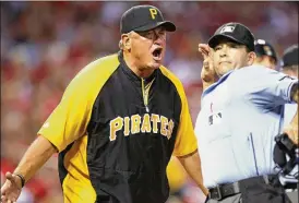  ?? ST. LOUIS POST-DISPATCH ?? Clint Hurdle (left) started his playing career as a September call-up, but as manager of the Pittsburgh Pirates, he’s no fan of late-season roster expansion.