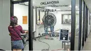  ?? [PHOTOS BY TIM MONEY, THE OKLAHOMAN] ?? A person walks into the Oklahoma Alcoholic Beverage Laws Enforcemen­t Commission on Wednesday. The agency is processing tens of thousands of necessary licenses in preparatio­n for Oct. 1, when new alcohol laws take effect.