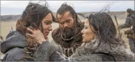  ?? COLUMBIA PICTURES ?? Kodi Smit-McPhee, left, J—hannes Haukur Jóhannesso­n and Natassia Malthe appear in a scene from “Alpha.”