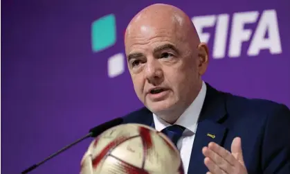  ?? Odd Andersen/AFP/Getty Images ?? Gianni Infantino said: ‘Once you look at it you also have to protect the essence and tradition of the game. There is no blue card.’ Photograph: