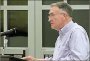  ?? / Adam Cook ?? Catoosa Chief Financial Officer Carl Henson explains the details of the county’s new three-year server agreement during the Jan. 15 Board of Commission­er’s meeting.