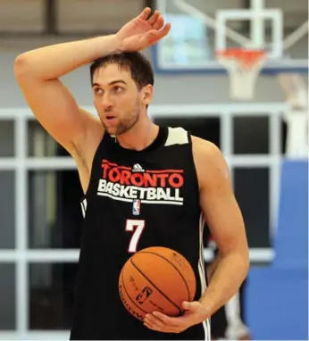  ?? TIM KROCHAK/THE CANADIAN PRESS ?? Raptors big man Andrea Bargnani works up a sweat during practice at the team’s training camp in Halifax.