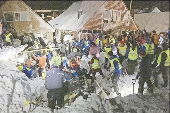  ?? EPA ?? Rescue personnel work in the area where an avalanche hit several houses in Norway on Friday.