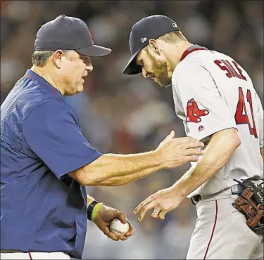  ?? GETTY ?? John Farrell gives Chris Sale the hook Sunday night against Yankees but Red Sox manager’s bullpen pours gasoline on the fire as Bombers belt rivals in season series finale.