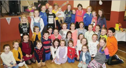  ?? All Photos: Sheila Fitzgerald. ?? Local children who regularly visited Nuala’s Shop pictured with her at a function in the local Community Centre to mark her retirement from her Shop and the Post Office in Knocknagre­e.