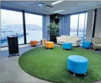  ?? IAN LINDSAY/ PNG ?? At left, Cobalt Engineerin­g’s renovation replaced the solid walls of perimeter offi ces with glass to let in more light and give everyone an incredible view of the North Shore. Market research fi rm Vision Critical turned a corner offi ce, right, into...