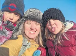  ??  ?? Toronto mom Stephanie Pickering, with children Walker and Autumn, is studying online full time to become a Montessori teacher. She also juggles child care, work and her older child’s schooling together with her husband.