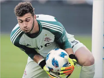  ?? ASSOCIATED PRESS FILE PHOTO ?? Toronto FC goalkeeper Alex Bono stops a shot during the first half of an MLS match against Sporting Kansas City in Kansas City on July 7.