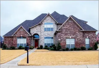  ?? LINDA GARNER-BUNCH/Arkansas Democrat-Gazette ?? This home, located at 112 Corondelet Lane in Maumelle, has about 3,509 square feet and is listed for $349,000 with Lynda Bowers of Lynda Bowers and Associates. Today’s open house, hosted by Dennis Blackwell, is from 2 to 4 p.m. For more informatio­n,...