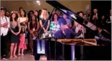  ?? CHINA DAILY ?? Chinese classical pianist Lang Lang performs Autumn Moon on a Calm Lake at Grand Central Station in New York on Saturday.