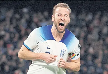  ?? REUTERS ?? England’s Harry Kane celebrates scoring against Italy during their Euro 2024 qualifier in Naples.
