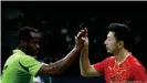  ??  ?? Nigeria's Quadri Aruna (left) congratula­tes China's Ma Long (right) after their Olympic quarterfin­al in 2016