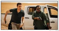  ?? Amazon/AP ?? John Krasinski and Wendell Pierce star in Tom Clancy’s Jack Ryan.