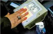  ?? GETTY IMAGES ?? Fingerprin­ting is part of the TSA Precheck screening. Approval allows access to expedited lanes.