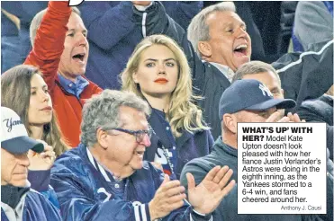  ?? Anthony J. Causi ?? WHAT’S UP’ WITH
HER? Model Kate Upton doesn’t look pleased with how her fiance Justin Verlander’s Astros were doing in the eighth inning, as the Yankees stormed to a 6-4 win, and fans cheered around her.