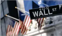  ?? MARK LENNIHAN/AP FILE ?? Much of Wall Street was on vacation Friday ahead of the New Year’s Day holiday. Trading was slow, with many fund managers closed out of their positions for 2021.