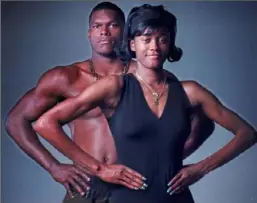  ?? Pittsburgh Post-Gazette ?? In 1997, Swin Cash was named the Post-Gazette High School Female Athlete of the Year while North Hills' LaVar Arrington won the Male award. They posed at the Post-Gazette for this portrait.