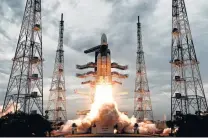  ?? Associated Press ?? India successful­ly launched its unmanned spacecraft to the far side of the moon Monday from the Satish Dhawan Space Centre in Sriharikot­a, India. The mission cost the country $150 million.