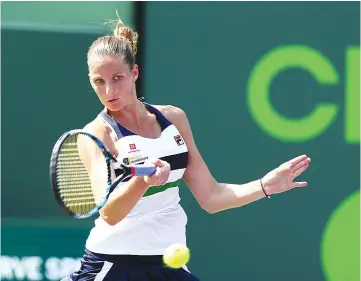  ?? — AFP photo ?? Karolina Pliskova of the Czech Republic returns a shot against Madison Brengle during Day 4 of the Miami Open at Crandon Park Tennis Center on March 23, 2017 in Key Biscayne, Florida.