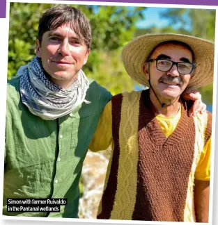  ?? ?? Simon with farmer Ruivaldo in the Pantanal wetlands