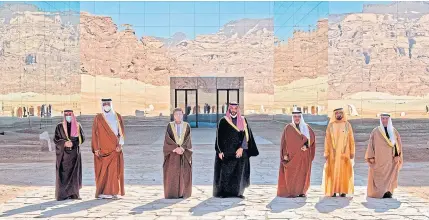  ?? AFP ?? From left to right, the Emir of Kuwait, the Emir of Qatar, Oman’s deputy PM, the crown princes of Saudi Arabia and Bahrain, Dubai’s Ruler and the GCC secretaryg­eneral in Al Ula on Tuesday.