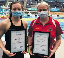  ??  ?? ON TIME: Mona McSharry and Grace Meade, her coach from Ballyshann­on Marlins Swim Club at the National Aquatic Centre on Tuesday after McSharry posted a qualifying time.
