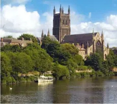  ??  ?? ABOVE Worcester Cathedral sits on a high bank overlookin­g the tranquil River Severn. With medieval cloisters, ancient crypt and chapter house, the cathedral houses the royal tombs of King John and Prince Arthur