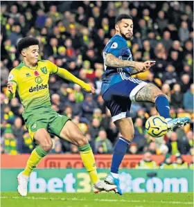  ??  ?? Cute finish: Andre Gray scores Watford’s second goal with a close-range back-heel