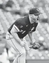  ?? Jason Miller / Getty Images ?? Closer Liam Hendriks and the White Sox appear headed for an AL Division Series matchup with the Astros.