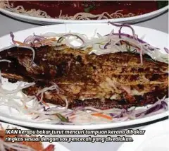  ??  ?? IKAN kerapu bakar turut mencuri tumpuan kerana dibakar ringkas sesuai dengan sos pencecah yang disediakan.