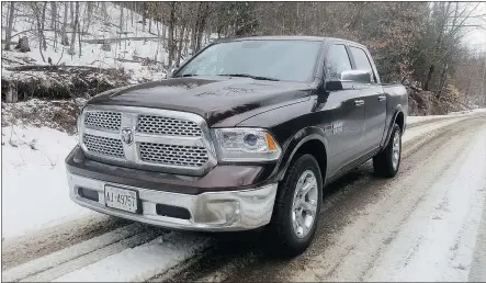  ?? — LESLEY WIMBUSH/DRIVING ?? With its aerodynami­cs and heft, the 2015 Ram Laramie Crew Cab is a head-turner.