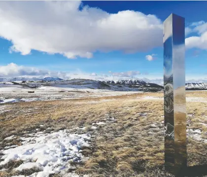  ??  ?? Elizabeth Williams, a massage therapist, says she helped install this stainless steel monolith to draw attention to potentiall­y harmful developmen­t in the eastern slopes of Alberta's Rocky Mountains. She says she hopes it will become a “beacon for the curious.”
