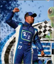  ?? ASSOCIATED PRESS ?? RICKY STENHOUSE JR. (17) CELEBRATES after winning the Camping World 500 auto race at Talladega Superspeed­way on Sunday in Talladega, Ala.