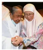  ??  ?? Together: Dr Wan Azizah greets Datin Paduka Mother Mangalam Iyaswary Iyer at The Christmas Day hi-tea reception.