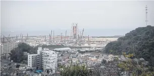  ??  ?? ABOVE
The site of a new coal-burning power plant under constructi­on in Yokosuka.