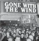  ??  ?? In this Dec. 19, 1939 ,file photo, a crowd gathers outside the Astor Theater on Broadway during the premiere of “Gone With the Wind” in New York.