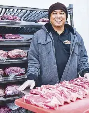  ??  ?? Noel Driz, meat production manager, Texas Roadhouse, meticulous­ly handles and prepares hand-cut steaks that speak of the best quality and flavor.