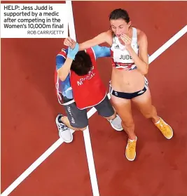  ??  ?? HELP: Jess Judd is supported by a medic after competing in the Women’s 10,000m final ROB CARR/GETTY