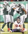  ?? Brett Coomer / Staff photograph­er ?? Norwalk native Kevin Pierre-Louis (56) celebrates after making a tackle on former UConn tight end Ryan Griffin in a 2018 game. Pierre-Louis is one of four Connecticu­t natives signed by new teams in a five-day span earlier this month.