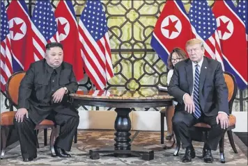  ?? Saul Loeb / Getty Images ?? President Donald Trump, right, and North Korea’s leader Kim Jong Un meet during the second U.s.-north Korea summit at the Sofitel Legend Metropole hotel in Hanoi on Thursday before the talks ended without an agreement.