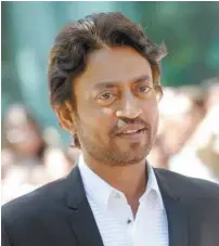  ?? JAG GUNDU GETTY IMAGES / AGENCE FRANCE-PRESSE ?? Irrfan Khan, ici montré au Festival internatio­nal du film de Toronto en 2013, s’est ouvert la route d’Hollywood en s’attachant à prendre ses distances avec les convention­s bollywoodi­ennes pour se concentrer sur la subtilité de son jeu.