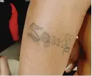  ??  ?? The tattooed arm of a member of the Black Souls gang| SUN- TIMES FILES