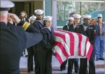  ?? STEPHEN B. MORTON / AP ?? Members of the U.S. Navy honor guard carry the casket of Naval Aircrewman Cameron Walters of Richmond Hill after his funeral service last month in Savannah. Walters was one of three sailors killed in the Naval Air Station Pensacola shooting.