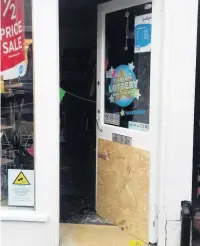  ??  ?? ●●Damage caused by the burglary at the Sue Ryder charity shop, in Gatley