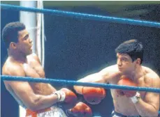  ?? FOTO: DPA ?? Volltreffe­r: Karl Mildenberg­er (rechts) bringt den großen Muhammad Ali ins Wanken.