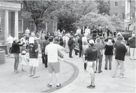  ?? PAUL W. GILLESPIE/BALTIMORE SUN MEDIA GROUP ?? Supporters of President Donald Trump attend Saturday’s rally at Lawyers Mall in Annapolis. The event was held to counter rallies criticizin­g the president.