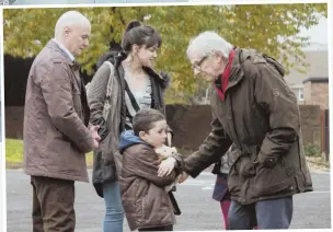  ??  ?? BACK TO WORK: Ken Loach, above, flirted briefly with retirement. Loach, at right, directs Dave Johns, Hayley Squires and Dylan McKiernan, from left, in ‘I, Daniel Blake.’