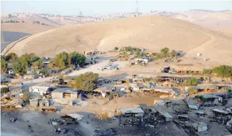  ?? — Reuters ?? A general view shows the main part of the Palestinia­n Bedouin village of Khan al Ahmar that Israel plans to demolish, in the occupied West Bank.