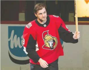  ?? MARC DESROSIERS/USA TODAY ?? Senators winger Bobby Ryan takes his bow Thursday at the Canadian Tire Centre, after being named the first star for his hat trick against Vancouver.